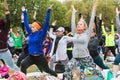 Women Do Warrior Pose At Massive Atlanta Outdoor Yoga Class Royalty Free Stock Photo