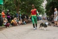 Contestants Wearing Batman And Robin Costumes Participate In Doggy Con