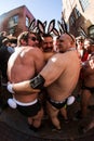 Men Wearing Speedos And Playboy Bunny Accessories Shiver Before Event Royalty Free Stock Photo