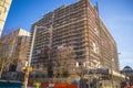 Downtown building scaffolding on a construction site Royalty Free Stock Photo