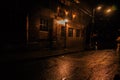 Downtown Atlanta Georgia Empty city street in the rain at night with street lamps Royalty Free Stock Photo