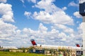 View of a Delta plane and cloudy blue skies