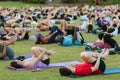 Dozens Do Wind Running Pose At Atlanta Outdoor Yoga Class
