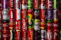 Atlanta, Georgia, USA April 4, 2020: Coca Cola background of many multicolored aluminum cans of different colors