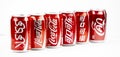 Atlanta, Georgia, USA April 4, 2020: five cans of Coca-Cola with a logo in different languages: Russian, Arabic, Korean