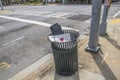 Atlanta Georgia waste can full of trash and protest signs