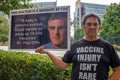 ATLANTA, UNITED STATES - Sep 25, 2020: An anti-vaccine protester stands outside of the CDC headquarters in Atlanta, Georgia with Royalty Free Stock Photo