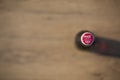 Atlanta USA May 1 2020 cap of classic glass Coca Cola Bottle on wooden backdrop