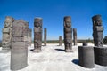 Atlantean figures and ancient pillars against blue sky at the arc Royalty Free Stock Photo