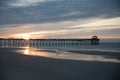 Atlantic beach pier on the North Carolina coast at sunset Royalty Free Stock Photo