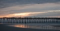 Atlantic beach pier on the North Carolina coast at sunset Royalty Free Stock Photo