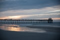 Atlantic beach pier on the North Carolina coast at sunset Royalty Free Stock Photo