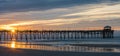 Atlantic beach pier on the North Carolina coast at sunset Royalty Free Stock Photo