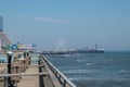 Atlantic City, New Jersey - July, 2019: View of the famous Atlantic City Steel Pier amusement park featuring a white ferris wheel. Royalty Free Stock Photo