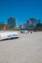 Atlantic City, New Jersey - May 24, 2019: View beautiful white beach sand with Atlantic City rescue boat turned upside down. Royalty Free Stock Photo