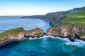 Atlantic coast in Northern Ireland with cliffs at Carrick-a-Rede rope bridge