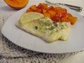 Atlantic cod fillet and red kuri squash Royalty Free Stock Photo