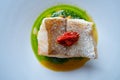 Atlantic hake over dried tomato ratatouille