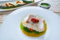 Atlantic hake over dried tomato ratatouille