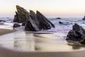 Atlantic ocean rocky coastline of Adraga beach. Portugal Royalty Free Stock Photo