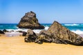 Atlantic ocean rocky coastline of Adraga beach. Portugal's rocky coast Royalty Free Stock Photo