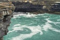 Atlantic ocean and rough stone coast line of Aran islands, county Galway, Ireland. Popular travel area with stunning wild nature