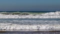 Atlantic Ocean waves breaking on sand beach in Agadir, Morocco, Africa Royalty Free Stock Photo