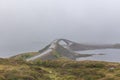 Atlantic road bridge in foggy weather, Atlantic seaside, Picturesque road between island number 64 from city Kristiansund in city Royalty Free Stock Photo