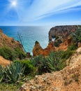 Atlantic rocky sunshiny coastline Algarve, Portugal. Royalty Free Stock Photo