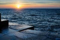 Atlantic sunset at the stone pier in calm weather. Nature. Royalty Free Stock Photo