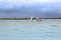 Atlantic wind surfers racing in the heavy storm