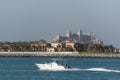 Boat in front of villas and Atlantis The Palm in Dubai Royalty Free Stock Photo