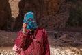 ATLAS MOUNTAINS, MOROCCO - 20 JAN: Nomad tribe people living in mountains near Tinghir or Tinerhir. Woman in canyon near