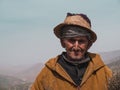 ATLAS MOUNTAINS, MOROCCO - March 28, 2018: Portrait of an old man in the Atlas mountains selling herbs Royalty Free Stock Photo