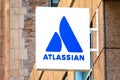 Atlassian logo at HQ of Australian enterprise software company. Atlassian develops products for software development, project Royalty Free Stock Photo