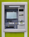 ATM on a green background
