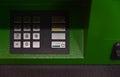 ATM keyboard green, shade, close-up