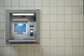 ATM machine. Automated teller bank cash machine on concrete wall Royalty Free Stock Photo