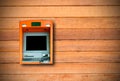 ATM machine with blank display built into wood wall. Royalty Free Stock Photo