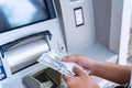 Atm machine money cash. Holding american bill cash. Woman withdraw money usd hundred dollar. Us dollar bill, bank credit