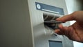 ATM reader taking credit card and returning it after identification, security Royalty Free Stock Photo