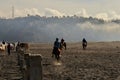 The atmosphere of the Bromo mountains in the morning, which is cold and foggy.