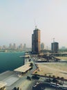 the atmosphere of the city of Lusail in the evening. Taken from the Katara Twin Tower with views of skyscrapers and blue sea water Royalty Free Stock Photo