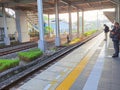 atmosphere at the jakarta train station in the morning