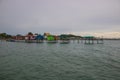 The atmosphere near the fishing pier on Samae Beach, Rayong.