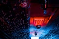 The atmosphere of a nightclub or bar, the interior with a ceiling and light bulbs, neon, smoke, disco ball