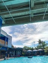 The atmosphere of the swimming pool with very beautiful clouds and a blue sky Royalty Free Stock Photo
