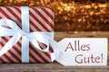 Atmospheric Christmas Gift With Label, Alles Gute Means Best Wishes Royalty Free Stock Photo