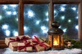 Atmospheric Christmas window sill decoration with lights Royalty Free Stock Photo