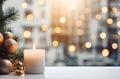 Atmospheric Christmas window sill decoration with white candle burning